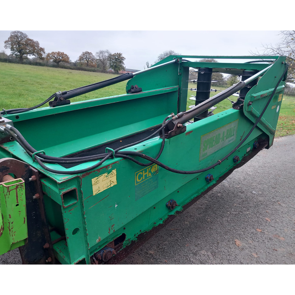 Used Spread a Bale Bedder