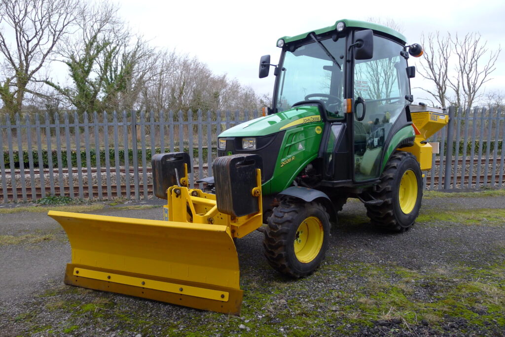 2022 John Deere 2026R compact tractor w/ plough & spreader